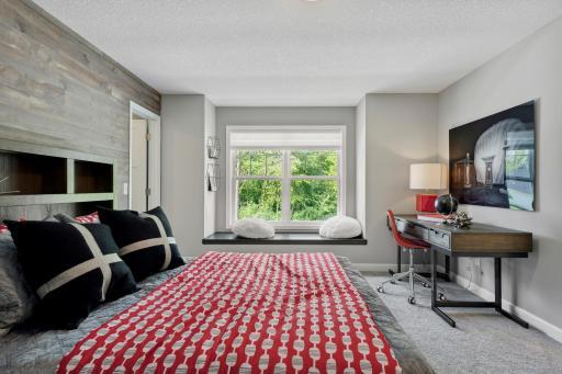Bedroom 4 with window seat. *Please note, photos are not of actual home, but of a similar model. Colors and features will vary in actual home.