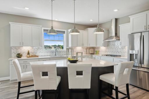 Kitchen will have white cabinets. *Please note, photos are not of actual home, but of a similar model. Colors and features will vary in actual home.