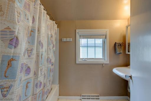 The full bathroom is near the rear entry as well