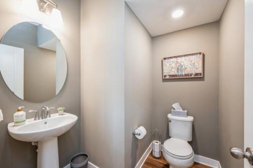 Pride in ownership shines through this home! A powder room services the main level. The storage closet next to it is a great place for coats when company visits.