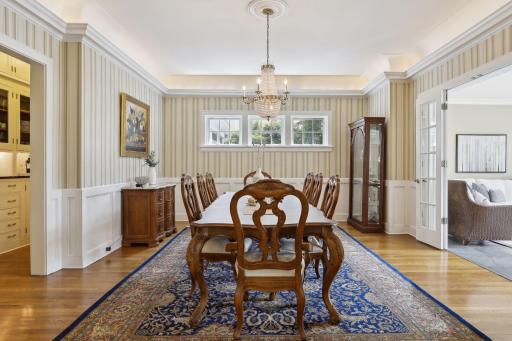 French doors open into the formal dining room.