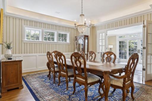 Many memorable meals will be shared here, from intimate candlelight dinners to large, festive holiday celebrations. Find lovely hardwood floors, triple windows, and eye-catching overhead lighting.