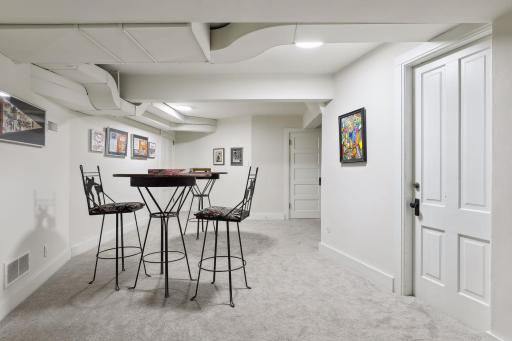 The large amusement room has a walk-in closet and space for hobbies and crafts.