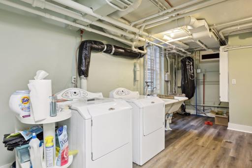 The laundry area has a double utility tub and plenty of super storage space. There is also a mudroom with access to the garage. A convenient half bath completes this level.