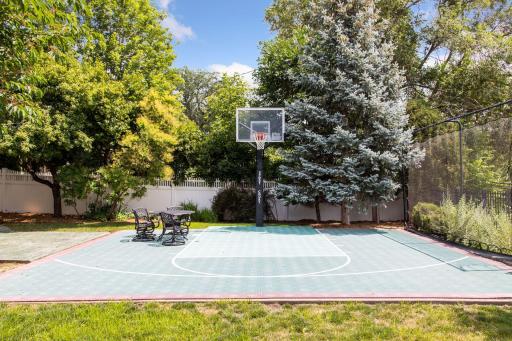 Watch the activity on the sport court while enjoying a gentle summer breeze.