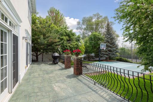 Catch a few rays of sun or dine "al-fresco" on the stamped concrete terrace.