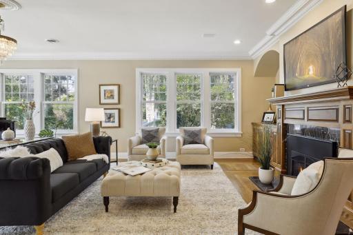 Two sets of large windows bathe this space in natural light.