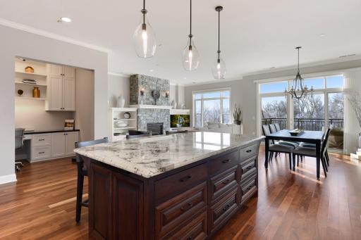 Kitchen opens to the living and dining areas