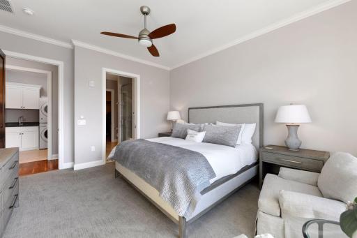 Large laundry room conveniently located just outside the primary suite