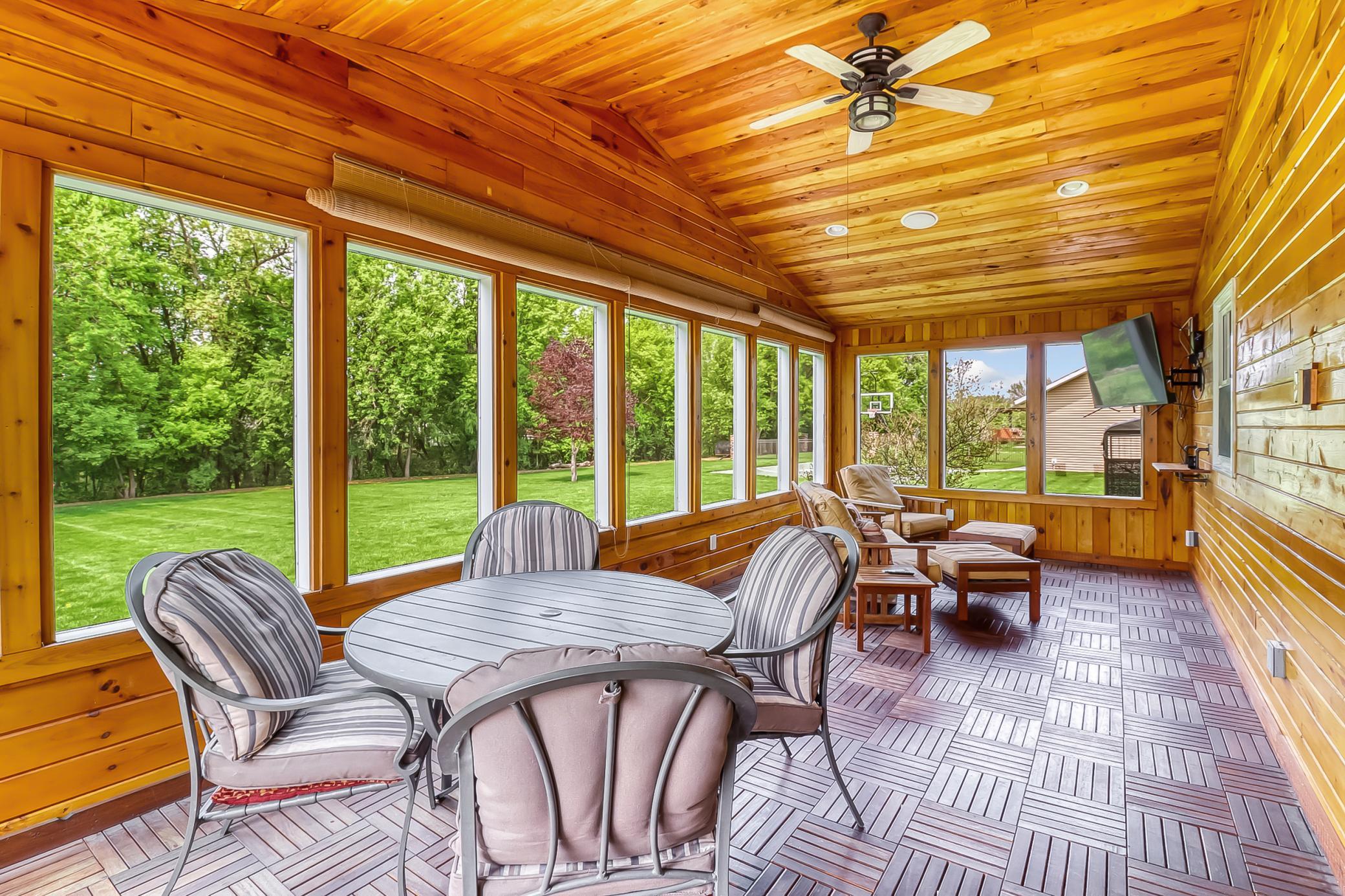 Sunroom
Wood flooring is very dense hardwood with a central drain located in the middle of the floor so entire porch can be hosed off for cleaning!