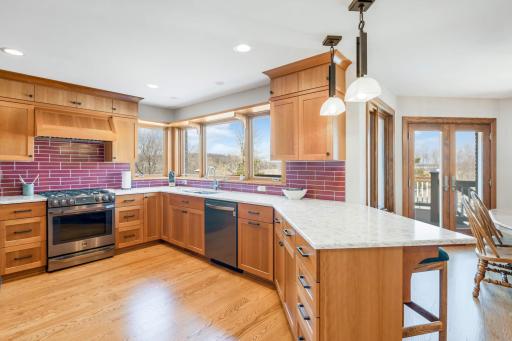 Kitchen with plenty of counters and a fantastic view of backyard, pond and Lake