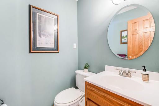 Main level half bath just off office and kitchen