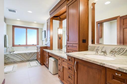 Primary bathroom dual sinks, in floor heat, separate water closet and bidet