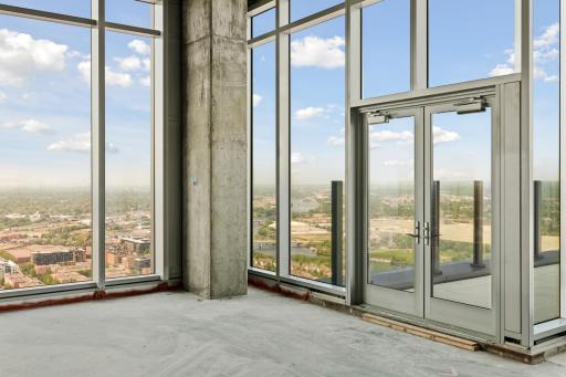 Penthouse sold as raw unbuilt space w/18' ceilings & panoramic views.