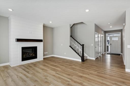 Luxury Vinyl Plank throughout entire main level (picture of similar home in neighborhood, options/colors will vary)