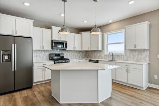 Kitchen (picture of similar home in neighborhood, options/colors will vary)