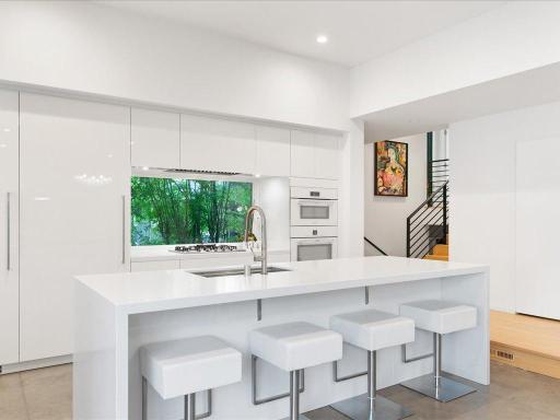 Concealed individual separate refrigerator unit, freezer unit, and drink fridge.