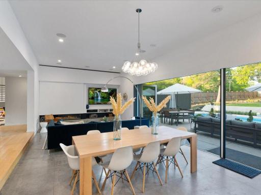 Centor sliding doors open to create one enormous open indoor/outdoor space. Giant sliding screen door brings in the fresh air and keeps the insects out.