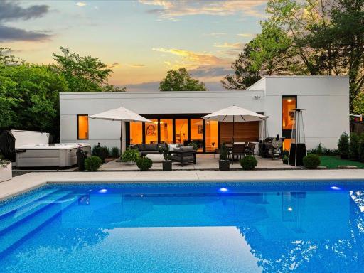 Welcome to your hidden private oasis. Architectural Palazzo Sport Pool with motorized cover and high-end Jacuzzi hot tub.