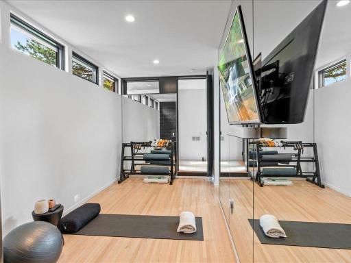 This hidden excercise room is accesible from the front entry.