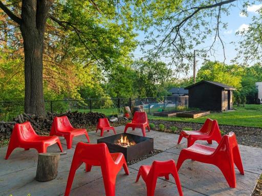 Custom stamped and stained concrete with iron firepit set.