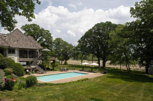 Stunning views over pool into nature filled wetlands