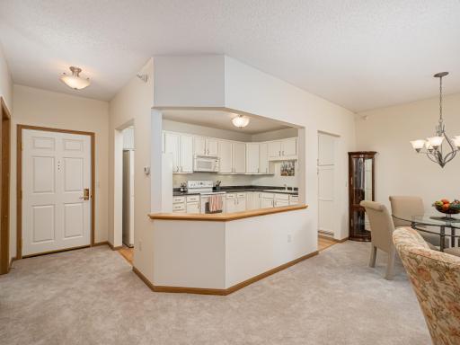 Entry and looking into large kitchen.