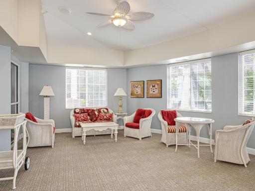 The sun room is a great gathering spot.