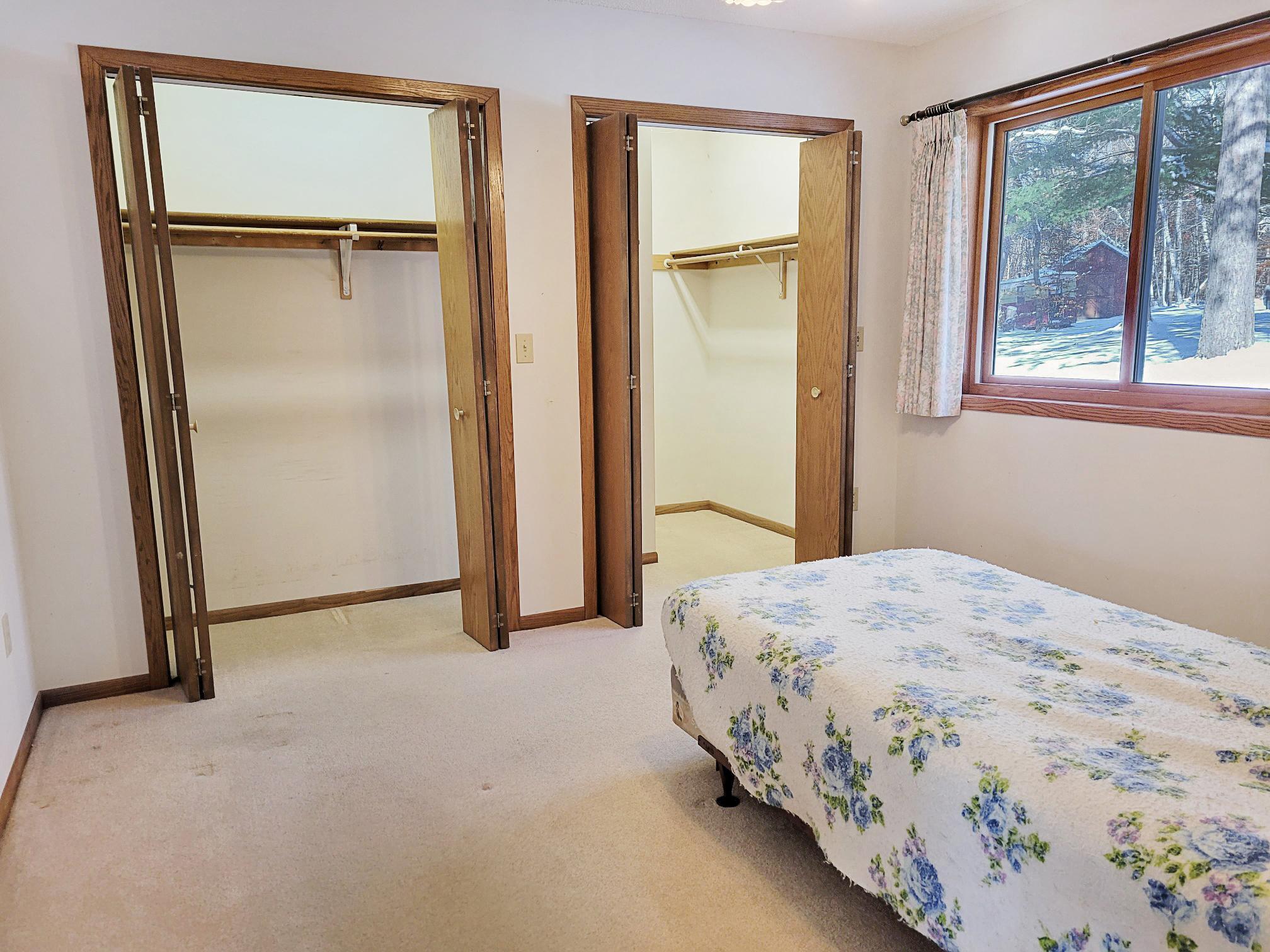 Walk-in closet in primary bedroom