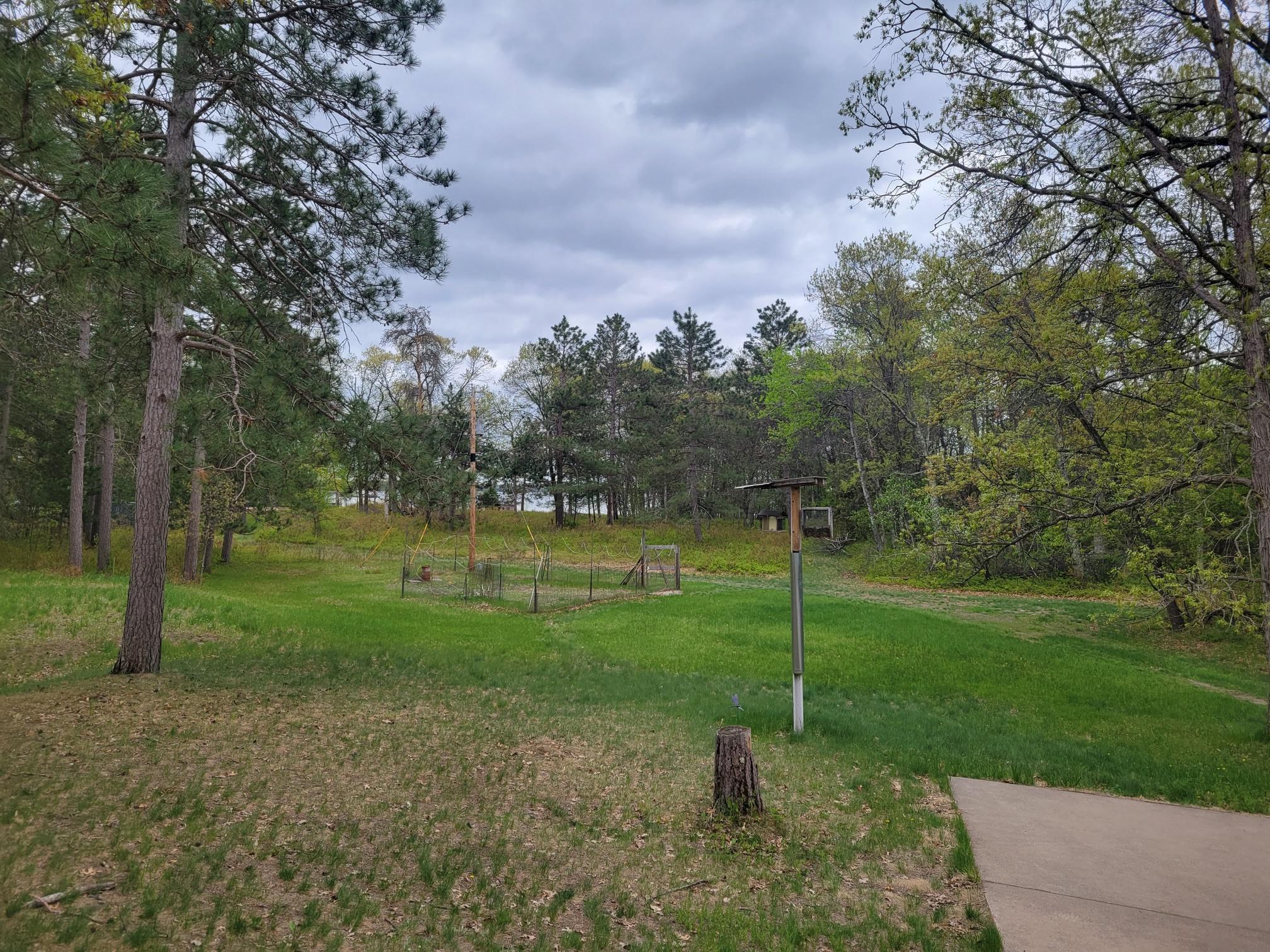 Facing the lake. Fenced garden area