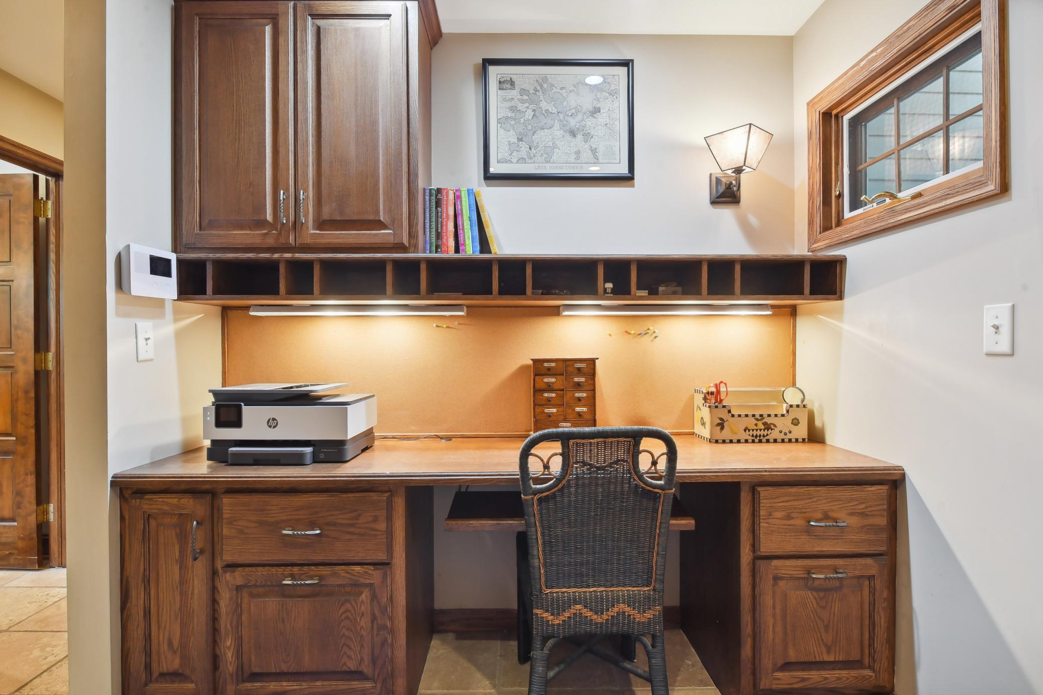 The mud room features a great control center to keep daily life schedules on track, as well as built in, enclosed cubbie storage.