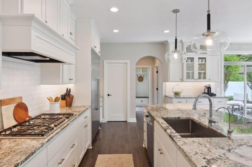 Stunning fixtures and details throughout. Mud room visible in the background.