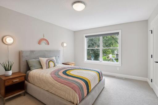 Fourth bedroom upstairs - this one with it's own private 3/4 ensuite bath.