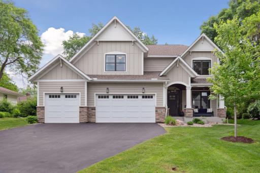 Welcome to 6009 Birchcrest Drive, custom built in 2018 and immaculately maintained and updated.