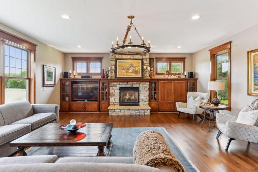 Living room with gas fireplace and built-ins.