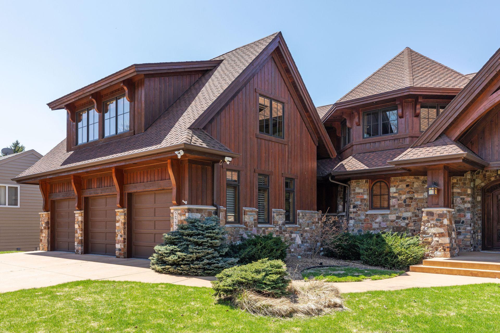 The three car attached garage offers a massive living space above it.