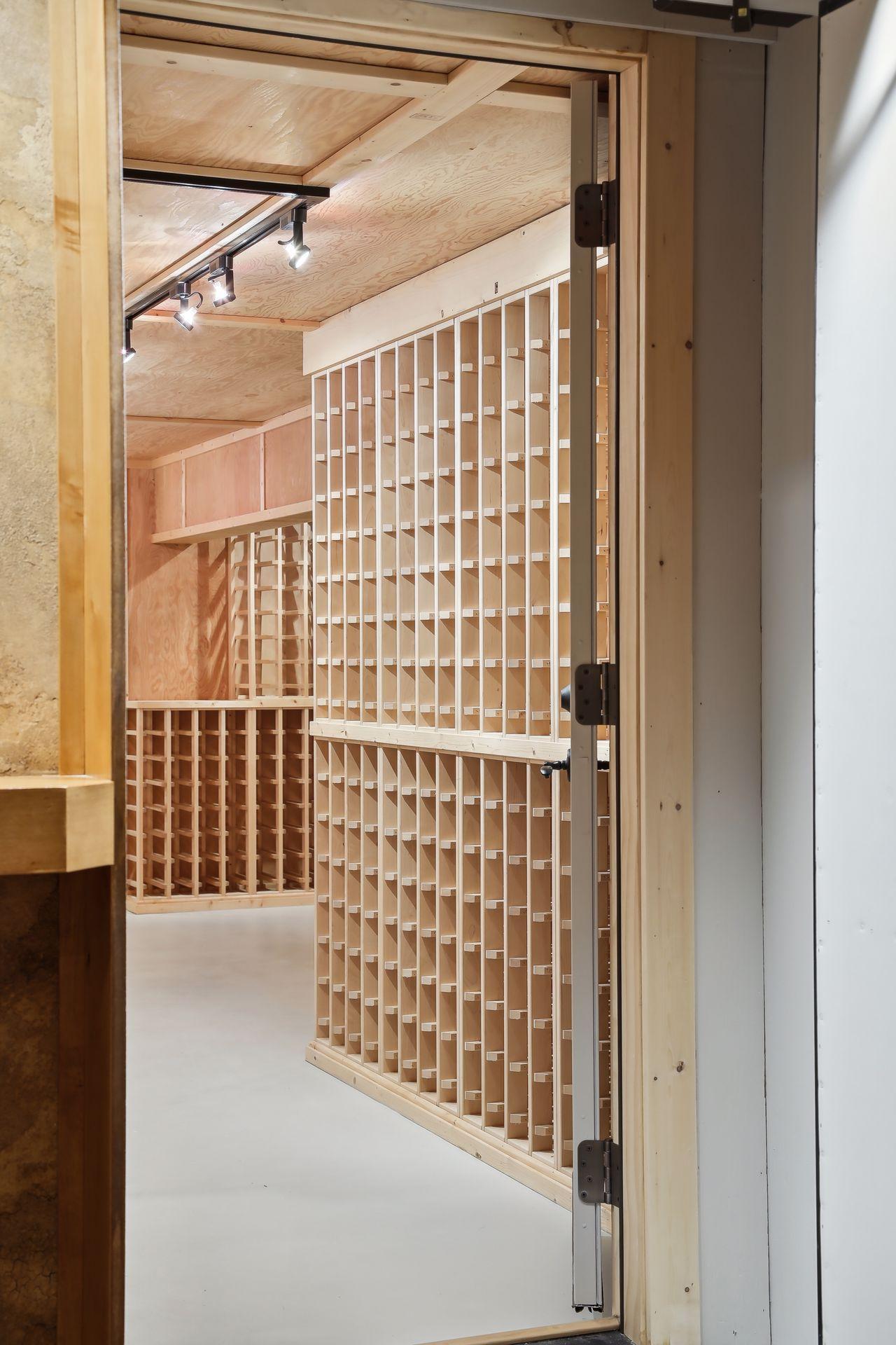 A James Bond moment as you enter the secret passage way to a State of the Art wind cellar.