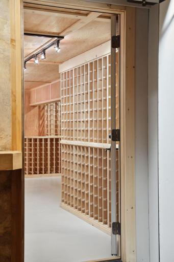 A James Bond moment as you enter the secret passage way to a State of the Art wind cellar.