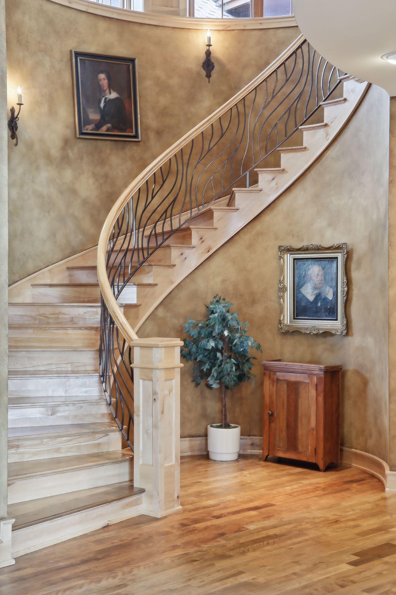 Impressive spiral staircase to the second level