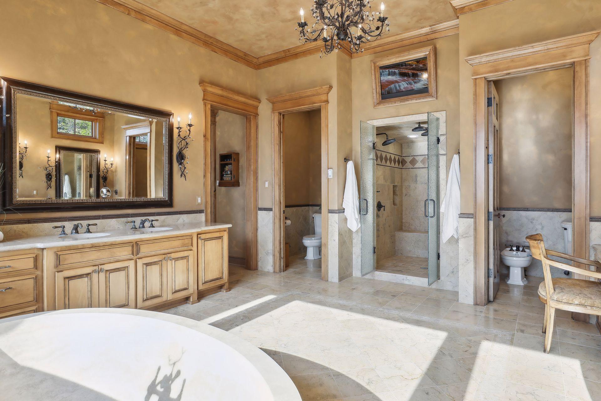 Heated floors, heated towel racks, and full steam shower are just a few of the perks in your primary bath