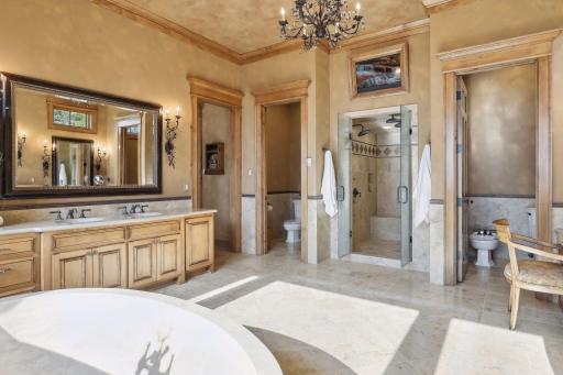 Heated floors, heated towel racks, and full steam shower are just a few of the perks in your primary bath