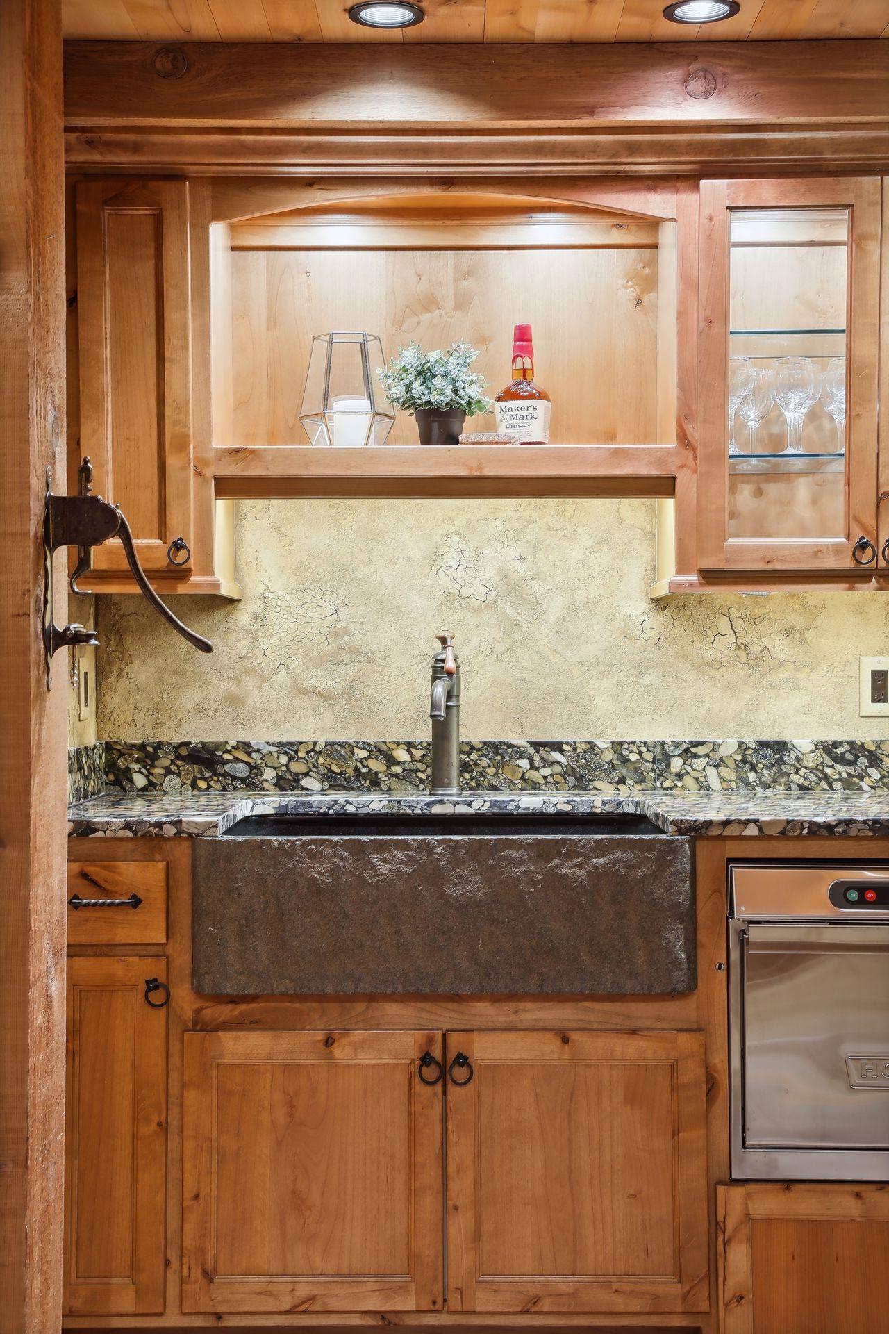 The extraordinary use of stone and wood species in this space is something you must experience. Gorgeous.