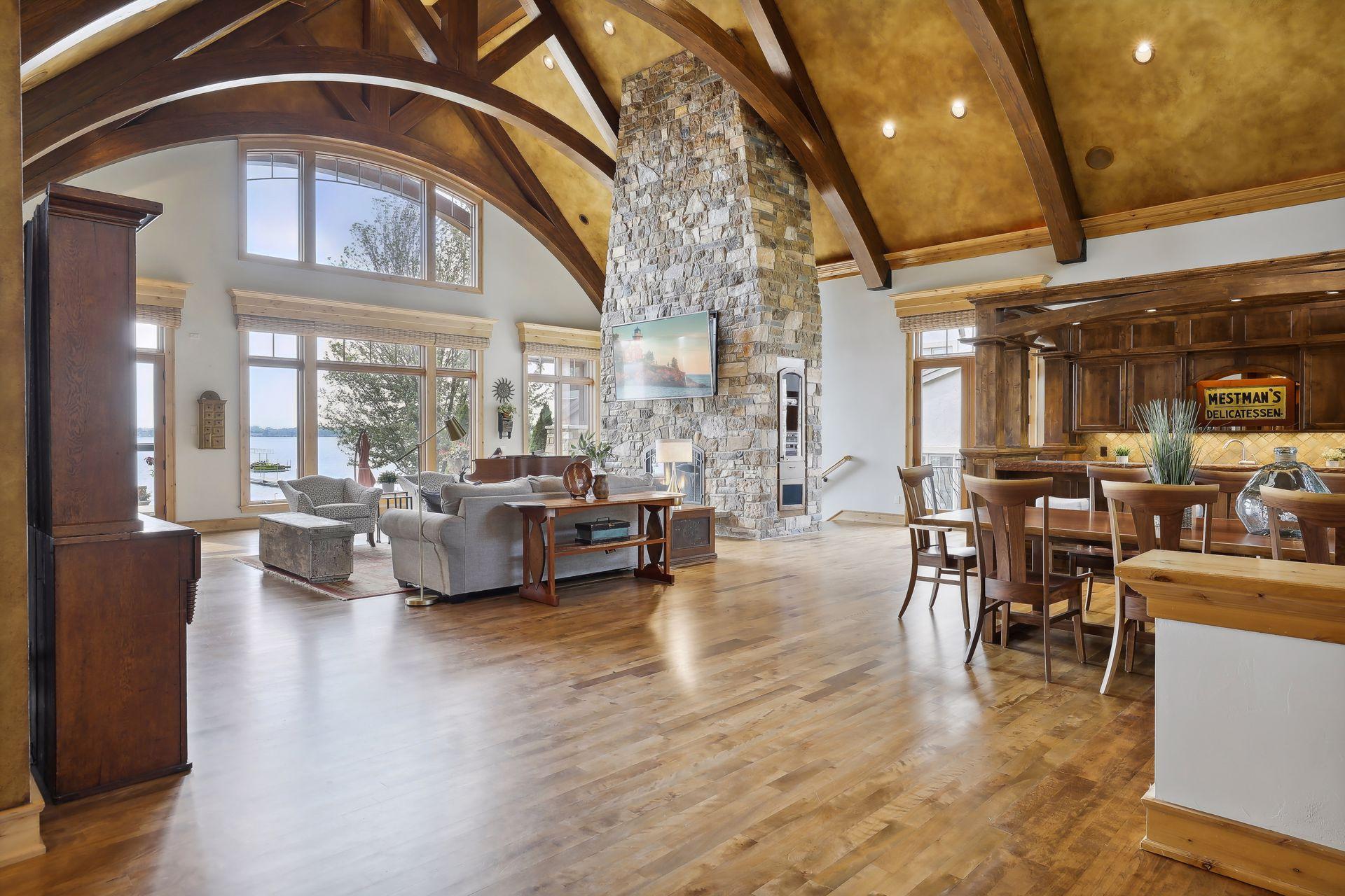Scale is incredible throughout with 35 foot ceilings and custom beams