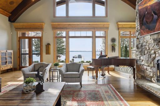 Expansive floor to ceiling windows overlook endless views of this beautiful lake.
