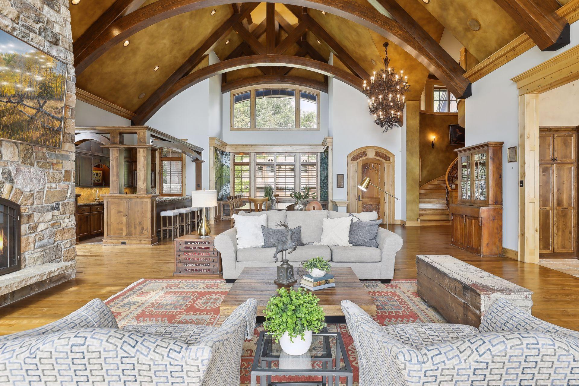 Spectacular Custom-crafted massive beams were lifted into this impressive grand living space.