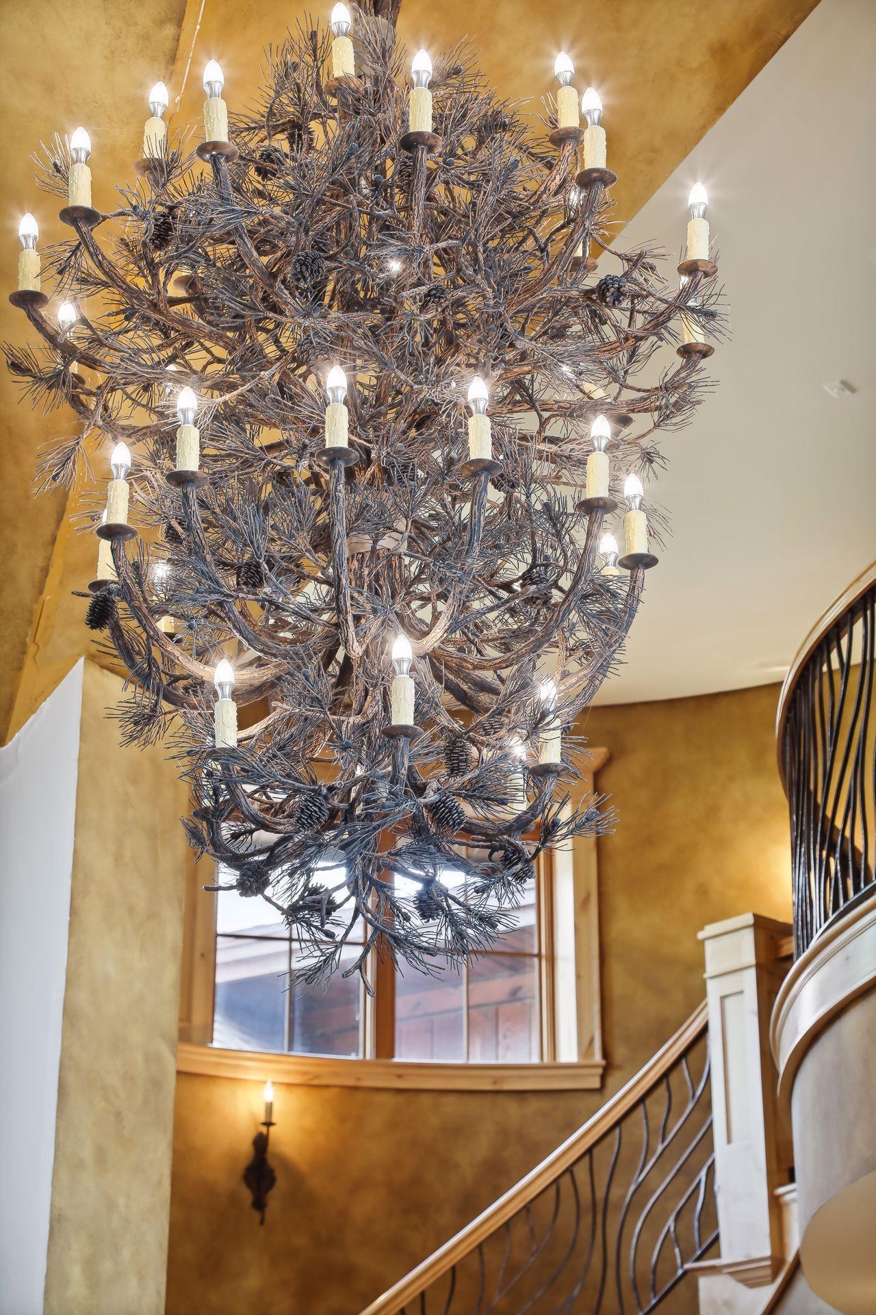 Custom iron chandelier - craned into the home