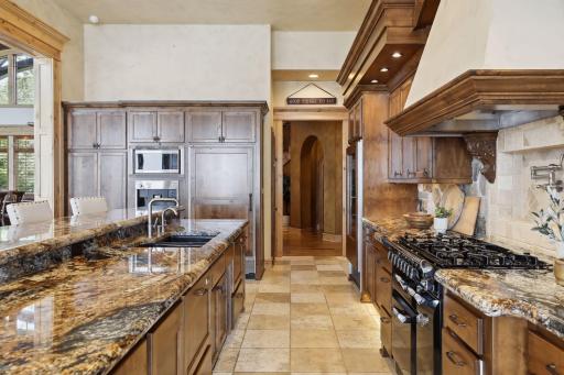 Chefs dream kitchen with every amenity you can think of to include heated floors and rotisserie
