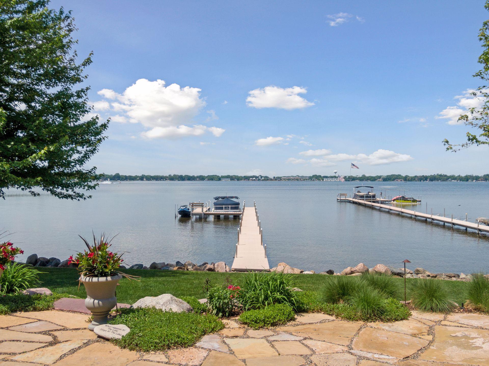 A gorgeous sandy 122 feet of private lakeshore awaits. How about a sunset cruise any night you chose.