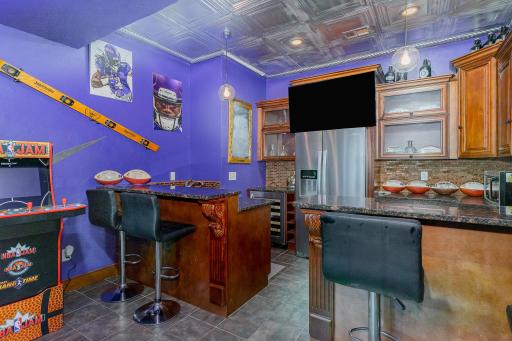 Come see the Custom Pub in lower level and then walk out to the patio and your very own in-ground swimming pool with adjacent hot tub and fire-pit overlooking the pond.