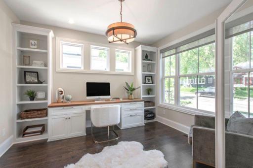 Main level office to the front of home.